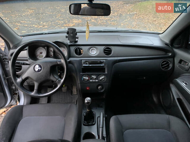 Серый Мицубиси Аутлендер, объемом двигателя 2 л и пробегом 239 тыс. км за 5800 $, фото 11 на Automoto.ua