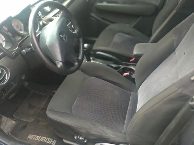 Серый Мицубиси Аутлендер, объемом двигателя 2.4 л и пробегом 286 тыс. км за 7400 $, фото 8 на Automoto.ua