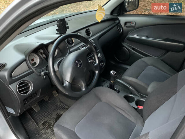 Серый Мицубиси Аутлендер, объемом двигателя 2 л и пробегом 239 тыс. км за 5800 $, фото 12 на Automoto.ua