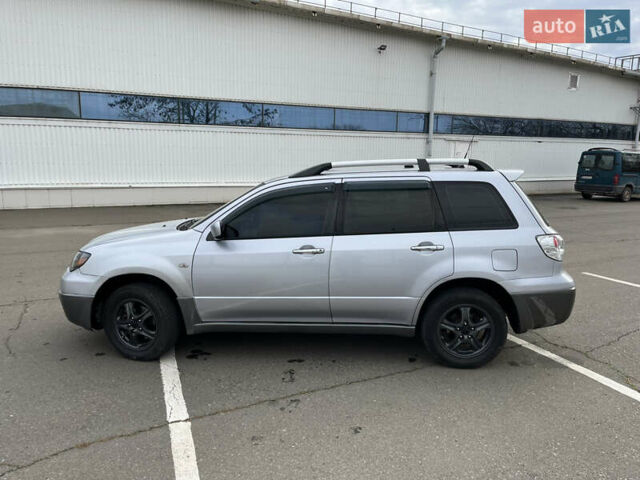 Сірий Міцубісі Аутлендер, об'ємом двигуна 2.38 л та пробігом 252 тис. км за 5400 $, фото 5 на Automoto.ua