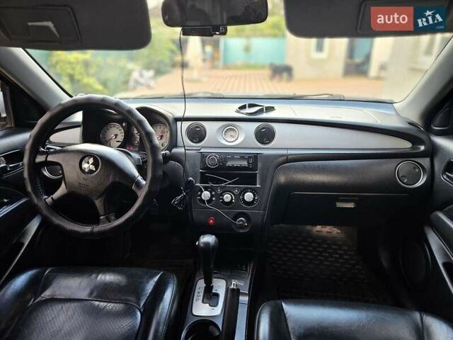 Сірий Міцубісі Аутлендер, об'ємом двигуна 2.4 л та пробігом 161 тис. км за 7500 $, фото 3 на Automoto.ua