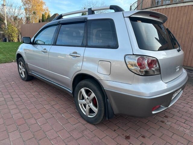 Серый Мицубиси Аутлендер, объемом двигателя 2.4 л и пробегом 221 тыс. км за 5550 $, фото 7 на Automoto.ua