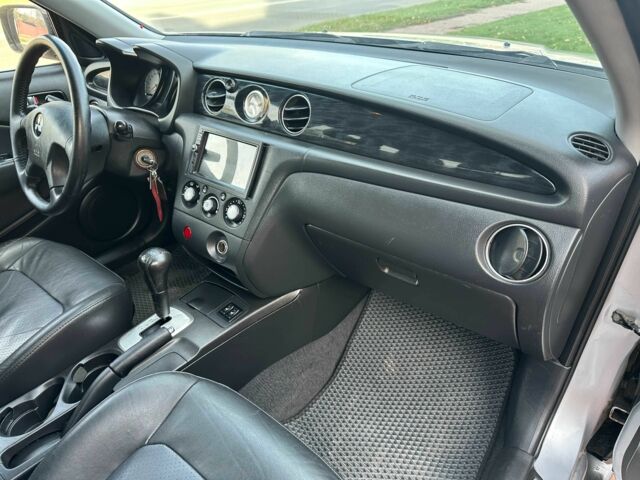 Серый Мицубиси Аутлендер, объемом двигателя 2.4 л и пробегом 221 тыс. км за 5550 $, фото 12 на Automoto.ua