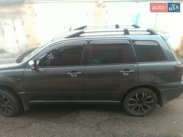 Сірий Міцубісі Аутлендер, об'ємом двигуна 2.35 л та пробігом 286 тис. км за 7400 $, фото 4 на Automoto.ua