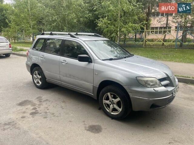 Серый Мицубиси Аутлендер, объемом двигателя 0 л и пробегом 275 тыс. км за 3000 $, фото 8 на Automoto.ua