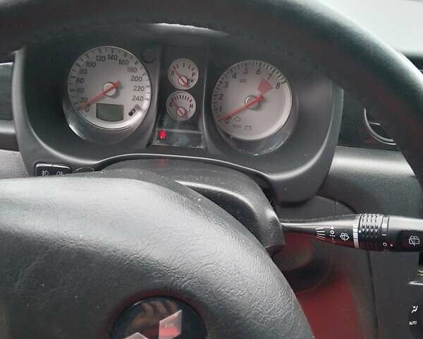 Серый Мицубиси Аутлендер, объемом двигателя 2.38 л и пробегом 255 тыс. км за 6000 $, фото 1 на Automoto.ua