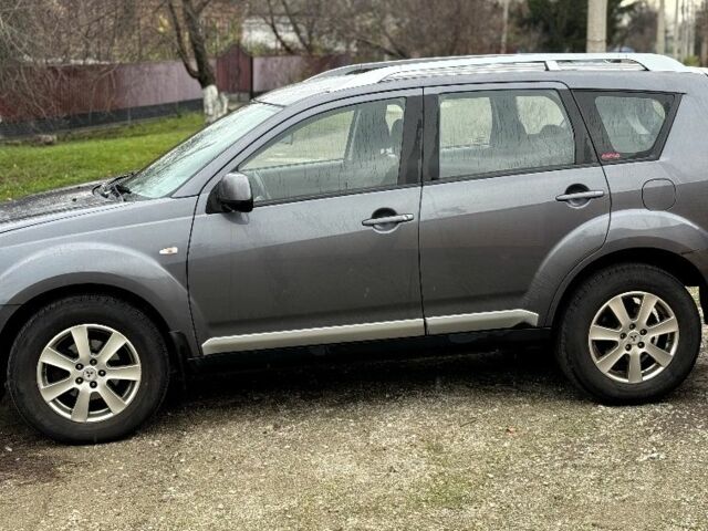 Серый Мицубиси Аутлендер, объемом двигателя 2 л и пробегом 290 тыс. км за 4500 $, фото 5 на Automoto.ua