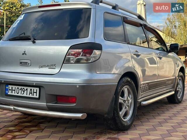 Сірий Міцубісі Аутлендер, об'ємом двигуна 2.4 л та пробігом 161 тис. км за 7500 $, фото 5 на Automoto.ua