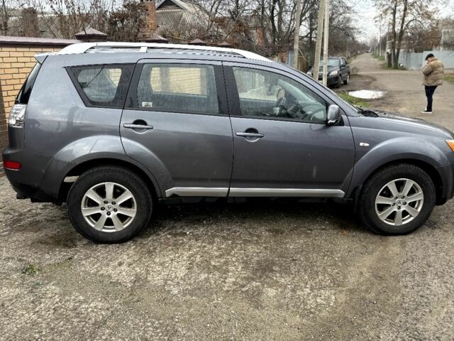 Серый Мицубиси Аутлендер, объемом двигателя 2 л и пробегом 290 тыс. км за 4500 $, фото 6 на Automoto.ua