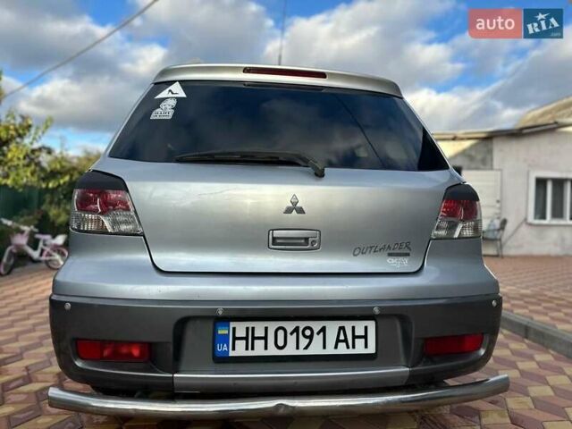 Сірий Міцубісі Аутлендер, об'ємом двигуна 2.4 л та пробігом 161 тис. км за 7500 $, фото 7 на Automoto.ua