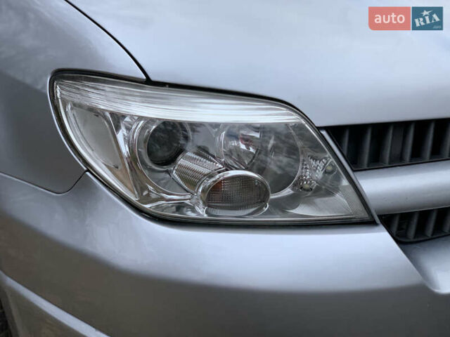 Серый Мицубиси Аутлендер, объемом двигателя 2 л и пробегом 239 тыс. км за 5800 $, фото 10 на Automoto.ua