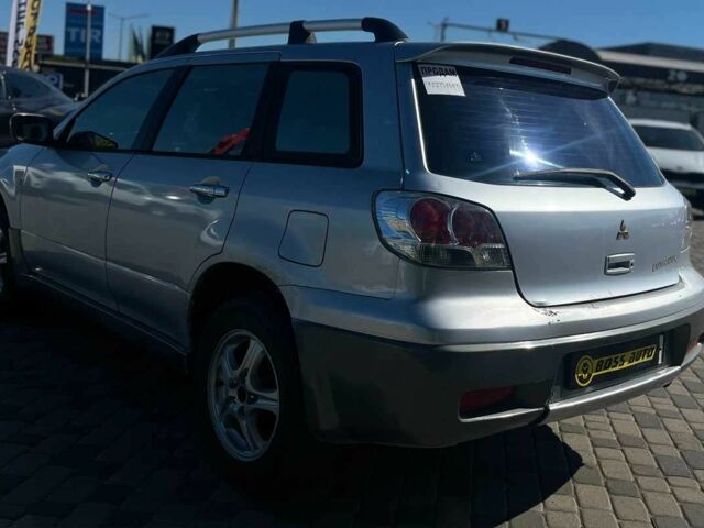 Серый Мицубиси Аутлендер, объемом двигателя 2.4 л и пробегом 240 тыс. км за 5700 $, фото 4 на Automoto.ua