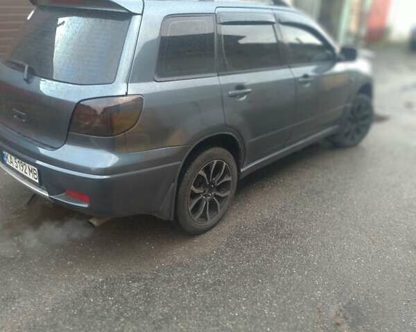 Сірий Міцубісі Аутлендер, об'ємом двигуна 2.35 л та пробігом 286 тис. км за 7400 $, фото 5 на Automoto.ua