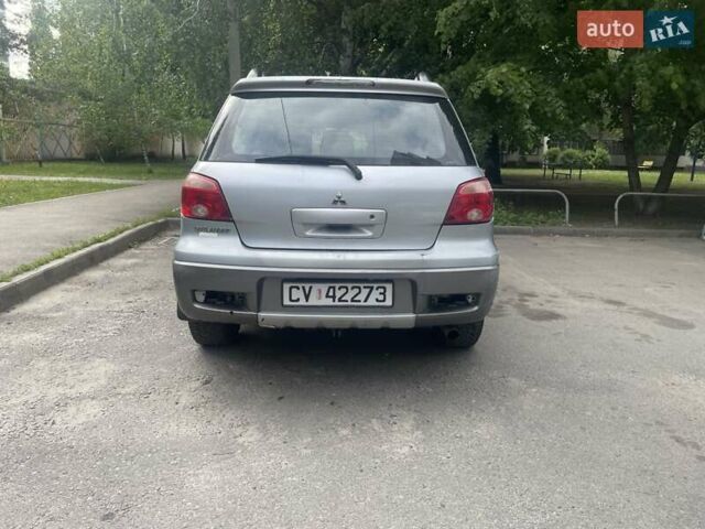 Серый Мицубиси Аутлендер, объемом двигателя 0 л и пробегом 275 тыс. км за 3000 $, фото 5 на Automoto.ua