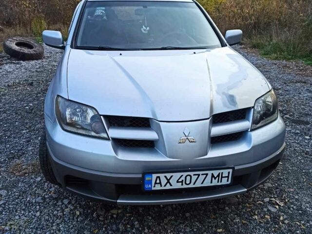 Серый Мицубиси Аутлендер, объемом двигателя 2.4 л и пробегом 317 тыс. км за 5200 $, фото 4 на Automoto.ua