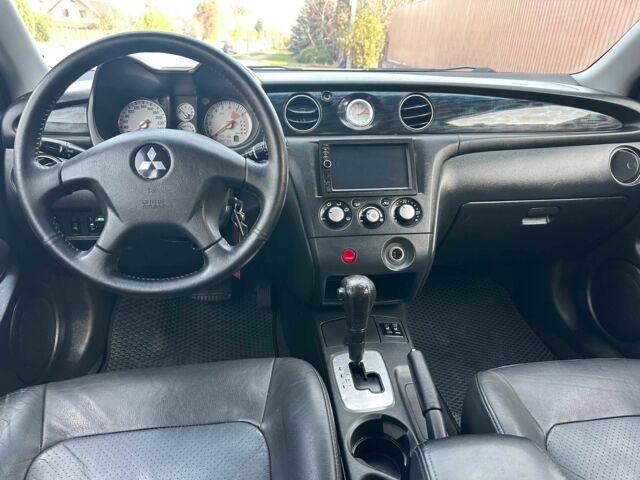 Серый Мицубиси Аутлендер, объемом двигателя 2.4 л и пробегом 221 тыс. км за 5550 $, фото 15 на Automoto.ua