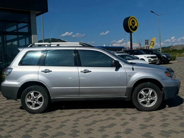 Серый Мицубиси Аутлендер, объемом двигателя 2.4 л и пробегом 240 тыс. км за 5700 $, фото 7 на Automoto.ua