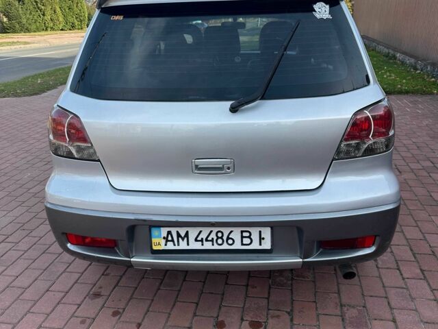 Серый Мицубиси Аутлендер, объемом двигателя 2.4 л и пробегом 221 тыс. км за 5550 $, фото 6 на Automoto.ua