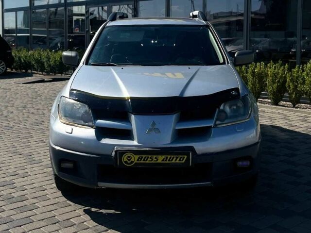Серый Мицубиси Аутлендер, объемом двигателя 2.4 л и пробегом 240 тыс. км за 5700 $, фото 1 на Automoto.ua