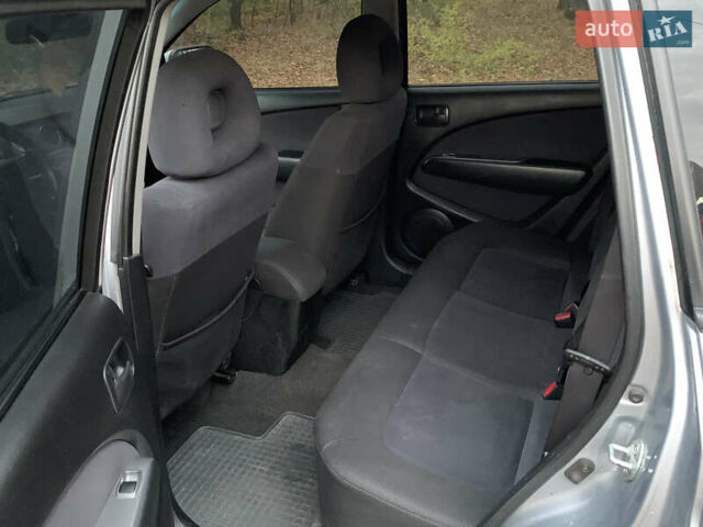 Серый Мицубиси Аутлендер, объемом двигателя 2 л и пробегом 239 тыс. км за 5800 $, фото 13 на Automoto.ua