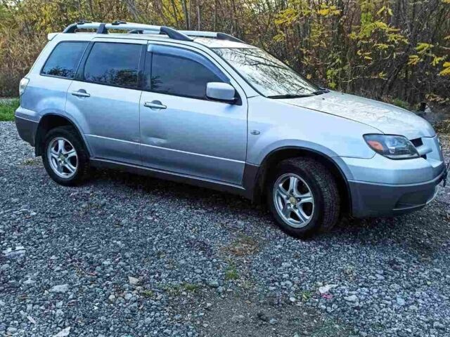 Серый Мицубиси Аутлендер, объемом двигателя 2.4 л и пробегом 317 тыс. км за 5200 $, фото 5 на Automoto.ua