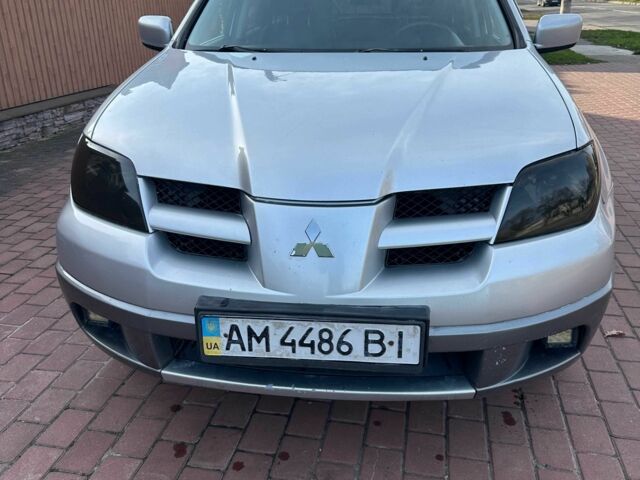 Серый Мицубиси Аутлендер, объемом двигателя 2.4 л и пробегом 221 тыс. км за 5550 $, фото 1 на Automoto.ua