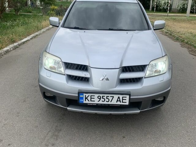 Серый Мицубиси Аутлендер, объемом двигателя 2.4 л и пробегом 229 тыс. км за 4850 $, фото 3 на Automoto.ua