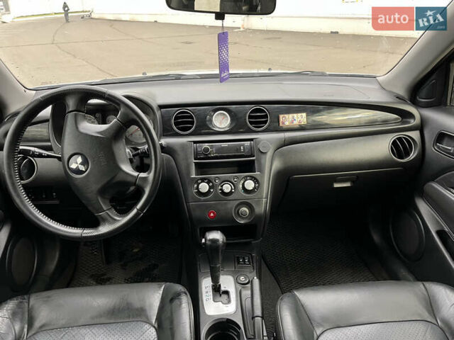 Сірий Міцубісі Аутлендер, об'ємом двигуна 2.38 л та пробігом 252 тис. км за 5400 $, фото 6 на Automoto.ua