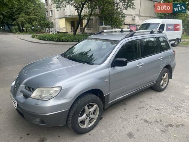 Серый Мицубиси Аутлендер, объемом двигателя 0 л и пробегом 275 тыс. км за 3000 $, фото 6 на Automoto.ua