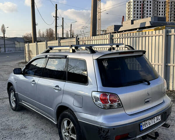 Серый Мицубиси Аутлендер, объемом двигателя 2.4 л и пробегом 260 тыс. км за 4750 $, фото 5 на Automoto.ua