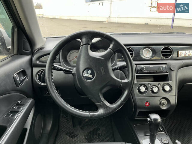 Сірий Міцубісі Аутлендер, об'ємом двигуна 2.38 л та пробігом 252 тис. км за 5400 $, фото 7 на Automoto.ua