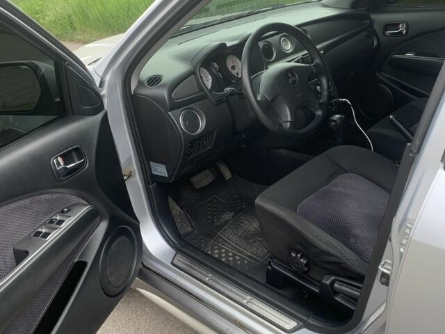 Серый Мицубиси Аутлендер, объемом двигателя 2.4 л и пробегом 229 тыс. км за 4850 $, фото 7 на Automoto.ua