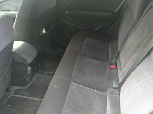 Серый Мицубиси Аутлендер, объемом двигателя 2.4 л и пробегом 286 тыс. км за 7400 $, фото 7 на Automoto.ua