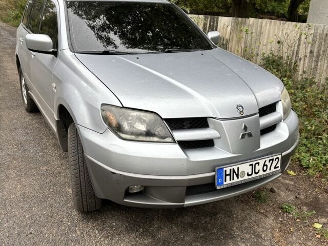 Серый Мицубиси Аутлендер, объемом двигателя 2 л и пробегом 2 тыс. км за 4261 $, фото 1 на Automoto.ua