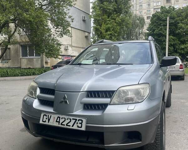 Серый Мицубиси Аутлендер, объемом двигателя 0 л и пробегом 275 тыс. км за 3000 $, фото 7 на Automoto.ua