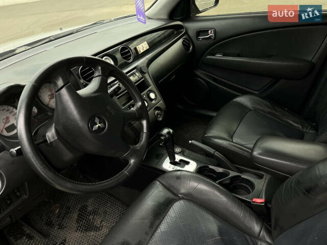 Сірий Міцубісі Аутлендер, об'ємом двигуна 2.38 л та пробігом 252 тис. км за 5400 $, фото 9 на Automoto.ua