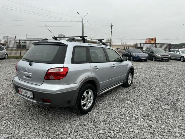 Серый Мицубиси Аутлендер, объемом двигателя 2.4 л и пробегом 260 тыс. км за 5750 $, фото 3 на Automoto.ua