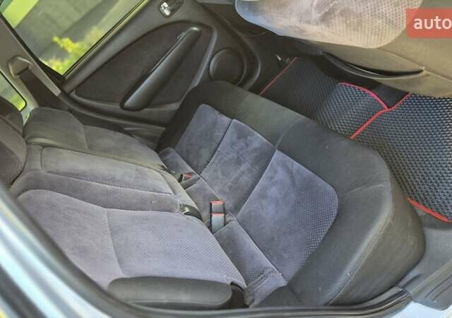 Сірий Міцубісі Аутлендер, об'ємом двигуна 2.4 л та пробігом 259 тис. км за 5999 $, фото 19 на Automoto.ua