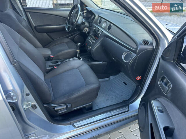 Серый Мицубиси Аутлендер, объемом двигателя 2 л и пробегом 220 тыс. км за 4550 $, фото 10 на Automoto.ua