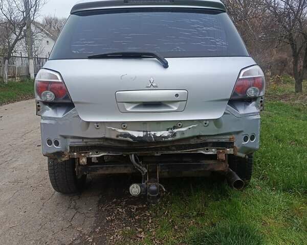 Сірий Міцубісі Аутлендер, об'ємом двигуна 2 л та пробігом 230 тис. км за 5200 $, фото 4 на Automoto.ua