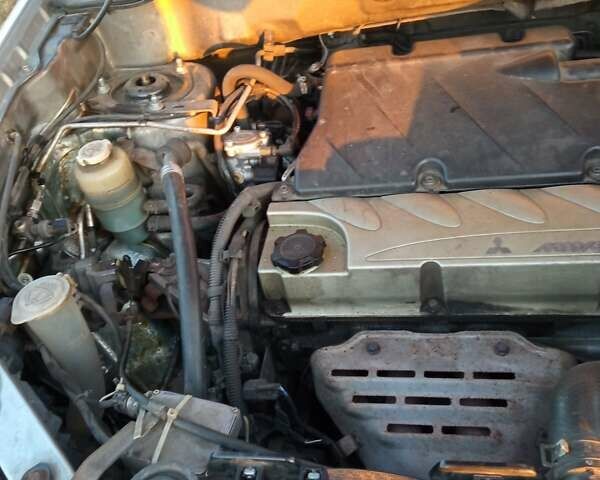 Мицубиси Аутлендер 2005 в Нежине на Automoto.ua Серый Мицубиси Аутлендер, объемом двигателя 2.38 л и пробегом 300 тыс. км за 4999 $, фото 9 на Automoto.ua