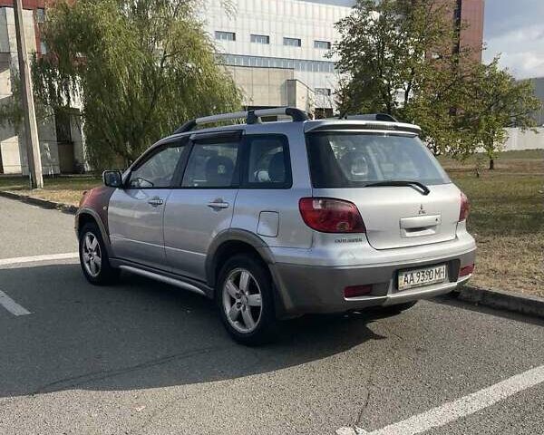 Серый Мицубиси Аутлендер, объемом двигателя 2.3 л и пробегом 202 тыс. км за 4000 $, фото 6 на Automoto.ua