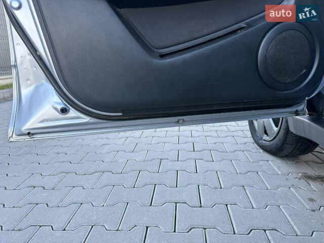 Серый Мицубиси Аутлендер, объемом двигателя 2 л и пробегом 220 тыс. км за 4550 $, фото 19 на Automoto.ua