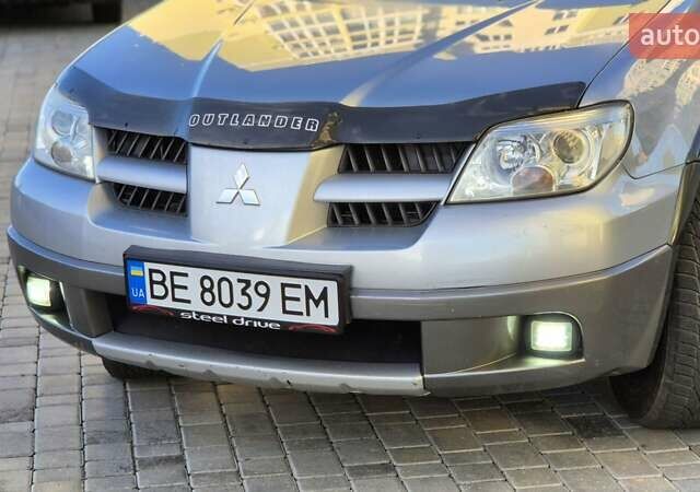Сірий Міцубісі Аутлендер, об'ємом двигуна 2.4 л та пробігом 259 тис. км за 5999 $, фото 16 на Automoto.ua