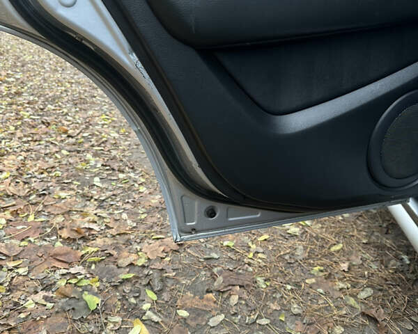 Сірий Міцубісі Аутлендер, об'ємом двигуна 2.38 л та пробігом 303 тис. км за 5200 $, фото 13 на Automoto.ua