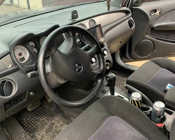 Сірий Міцубісі Аутлендер, об'ємом двигуна 2.4 л та пробігом 230 тис. км за 5927 $, фото 3 на Automoto.ua