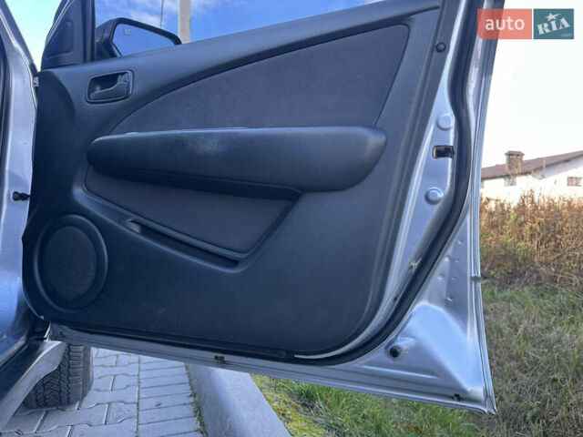 Серый Мицубиси Аутлендер, объемом двигателя 2 л и пробегом 220 тыс. км за 4550 $, фото 15 на Automoto.ua