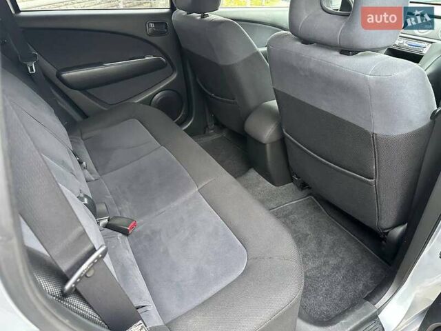 Серый Мицубиси Аутлендер, объемом двигателя 2 л и пробегом 236 тыс. км за 6600 $, фото 10 на Automoto.ua