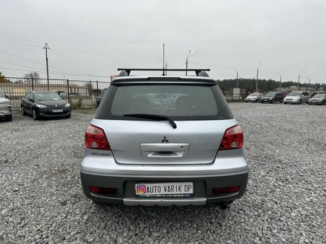 Серый Мицубиси Аутлендер, объемом двигателя 2.4 л и пробегом 260 тыс. км за 5750 $, фото 4 на Automoto.ua