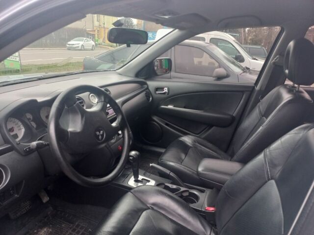 Серый Мицубиси Аутлендер, объемом двигателя 2.4 л и пробегом 246 тыс. км за 5500 $, фото 6 на Automoto.ua